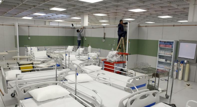 To tackle the number of coronavirus cases, Iran has set up makeshift hospitals like this one in the Iran Mall, a vast shopping and leisure complex northwest of Tehran