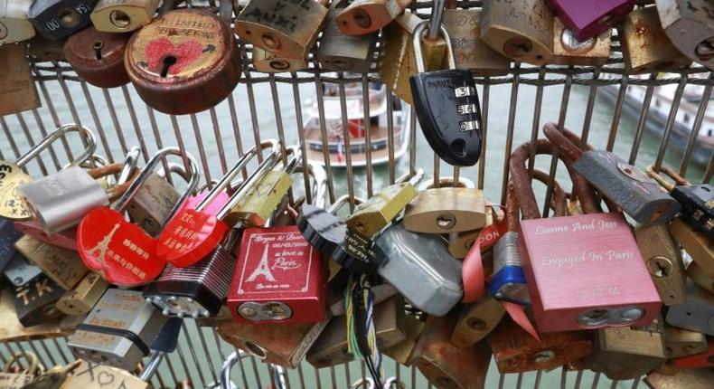 The trend for leaving 'love locks' on Paris bridges eventually became an eyesore and a danger