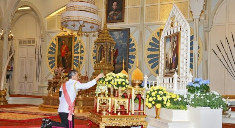 Prince Maha Vajiralongkorn pays respects to his late father King Bhumibol Adulyadej in Bangkok, as he accepts the invitation to ascend to the throne