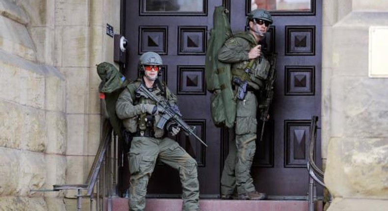 Police officers at the Canadian Parliament after a soldier was shot near the building in Ottawa on October 22, 2014. The parliament is now on lock down 