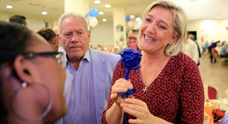 French presidential candidate Marine Le Pen is trying to detoxify her far-right Front National party's image and is picking up support in the process