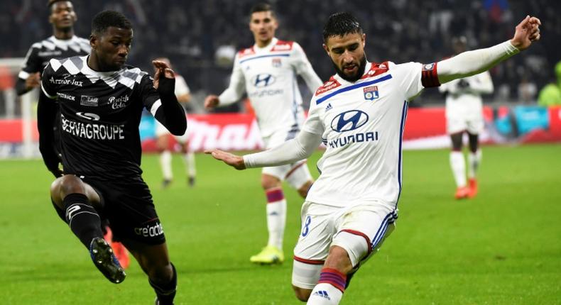 Nabil Fekir (R) came through Lyon's youth system and is now the club's captain as well as a World Cup winner