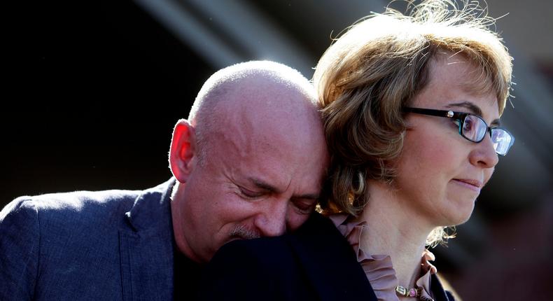 Mark Kelly leans his head on the shoulder of his wife, former Congresswoman Gabby Giffords.Joshua Lott/Getty Images