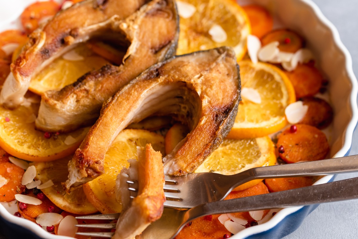 Fried,Carp,Fish,Slices,With,Carrot,And,Oranges.,Traditional,Polish