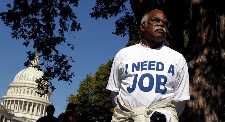 Mervin Sealy from Hickory, North Carolina, takes part in a protest rally outside the Capitol Building in Washington, October 5, 2011. Demonstrators were demanding that Congress create jobs, not make budget cuts during the protest.