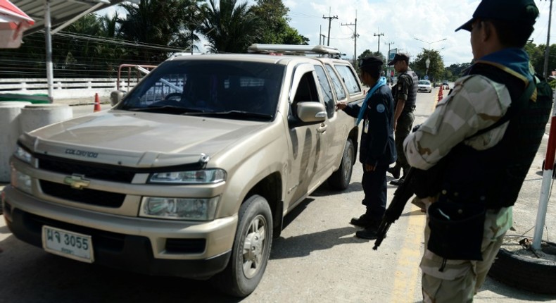 Armed civil defence volunteers and police have been searching vehicles at checkpoints in the southern province of Narathiwat