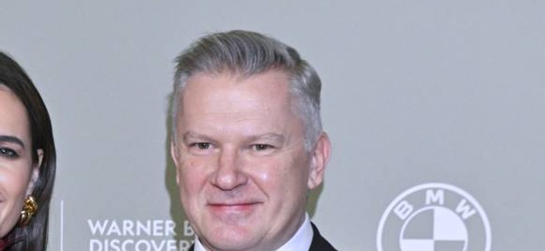 Grzegorz Kajdanowicz na balu TVN. Pojawił się z nową partnerką [FOTO]