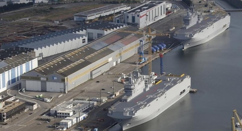 The two Mistral-class helicopter carriers Sevastopol (Bottom) and Vladivostok are seen at the STX Les Chantiers de l'Atlantique shipyard site in Saint-Nazaire, western France, May 25, 2015. REUTERS/Stephane Mahe