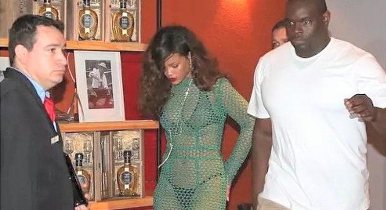 Pop singer, Rihanna, steps out in mesh outfit while in Rio