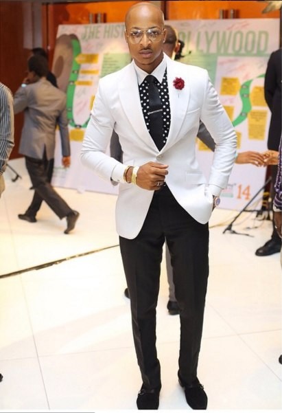 Ik Ogbonna in a black and white ensemble 