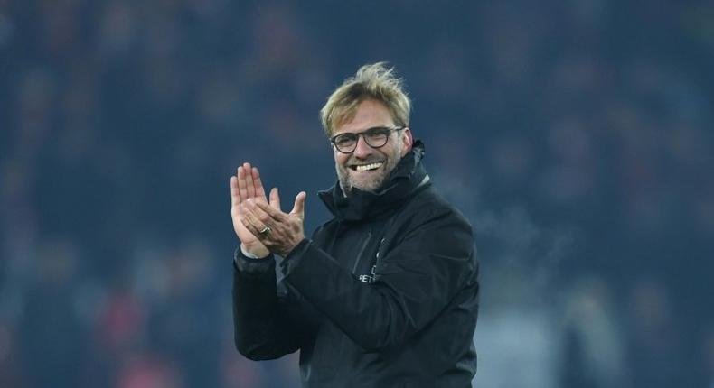 Liverpool manager Jurgen Klopp cheers with the crowd at the end of the match against Sunderland at Anfield on November 26, 2016