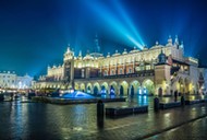 Poland, Krakow. Market Square at night.