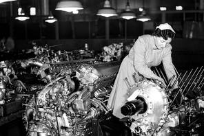 World War Two. 1942. England. A woman at work during the war making Rolls Royce Merlin aircraft engi