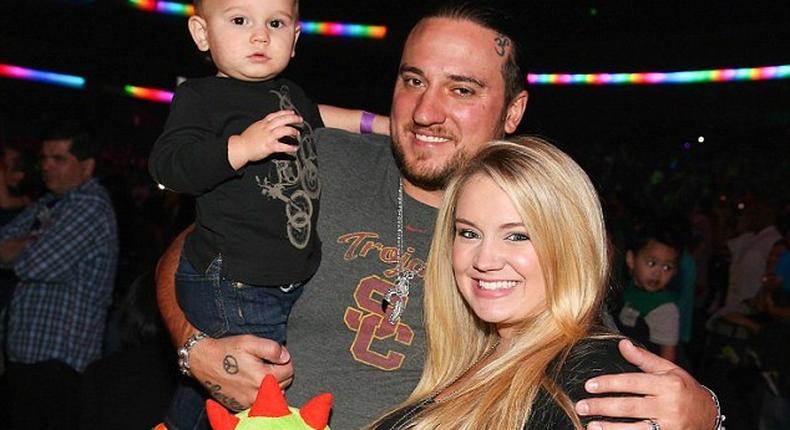 pregnant Tiffany Thornton and Chris Carney with their first son