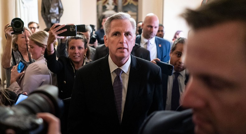 Rep. Kevin McCarthy of California wades through reporters on the way to the House floor.Kent Nishimura /Los Angeles Times via Getty Image