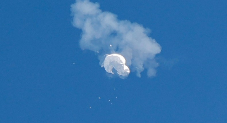 The suspected Chinese spy balloon drifts to the ocean after being shot down off the coast in Surfside Beach, South Carolina, U.S. February 4, 2023.Randall Hill/Reuters