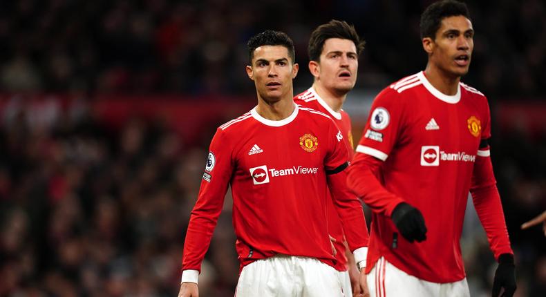 Manchester United's Cristiano Ronaldo, Harry Maguire and Raphael Varane during the Premier League match at Old Trafford on March 12, 2022.
