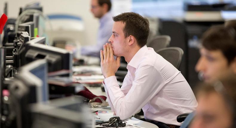 A trader looks at his screen on the IG Group trading floor in London March 18, 2013. IG is a major CFD provider.