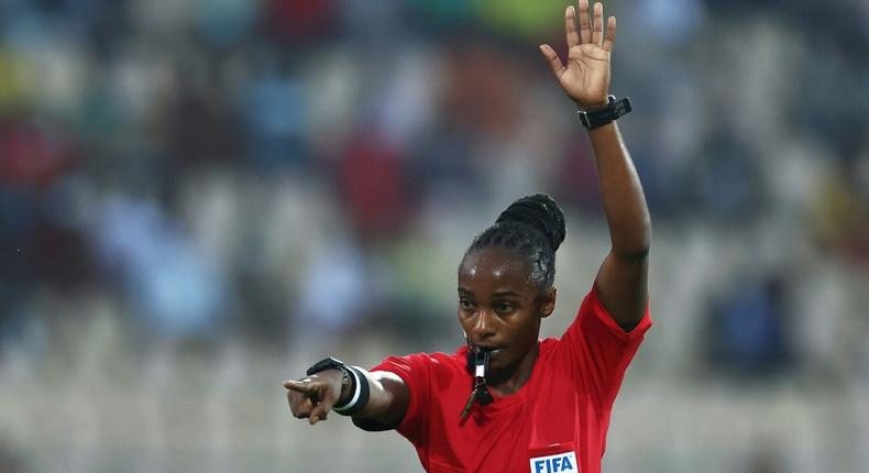 History-making Rwandan referee Salima Mukansanga gestures during an Africa Cup of Nations Group B match between Zimbabwe and Guinea in Yaounde on Tuesday. Creator: Kenzo Tribouillard