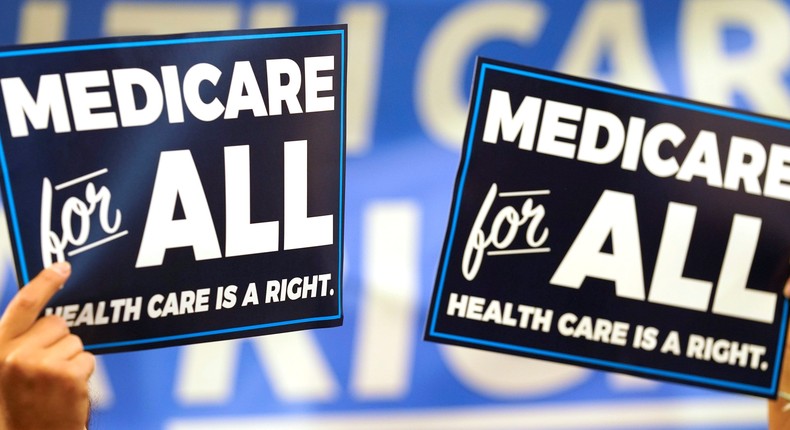 Medicare for All signs
