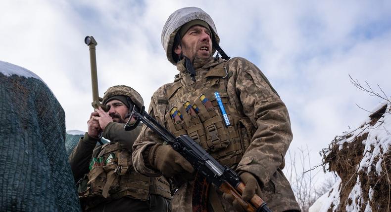 Ukrainian soldiers patrol on the frontline in Zolote, Ukraine on January 20, 2022.