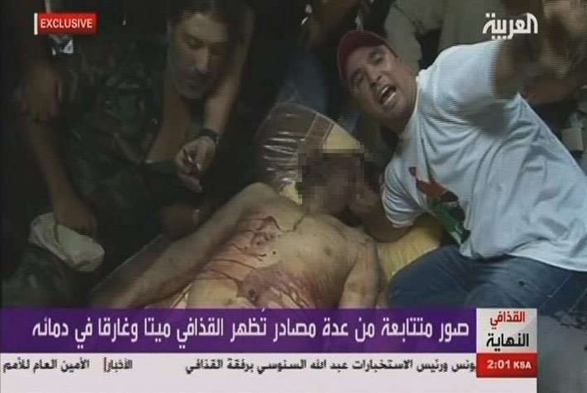 Wystawili ciało Kaddafiego na widok publiczny