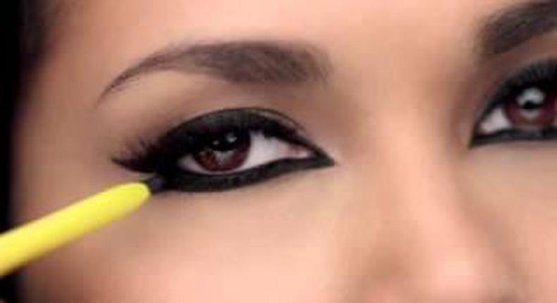 Model applies Maybelline Colossal Kajal