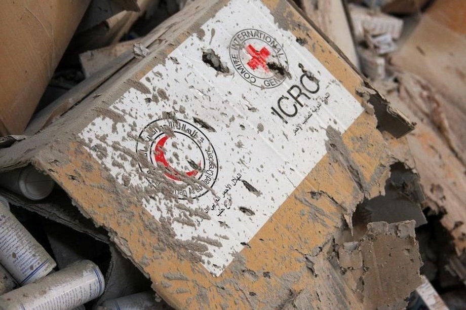 Damaged Red Cross and Red Crescent medical supplies inside a warehouse after an airstrike on the rebel-held Urm al-Kubra town.