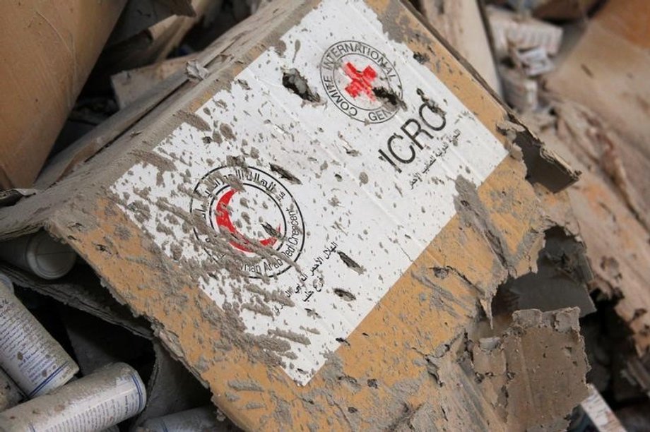 Damaged Red Cross and Red Crescent medical supplies inside a warehouse after an airstrike on the rebel-held Urm al-Kubra town.