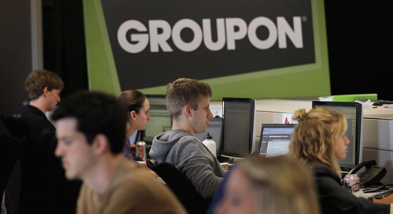 Workers work on projects at Groupons international headquarters on June 10, 2011 in Chicago, Illinois.