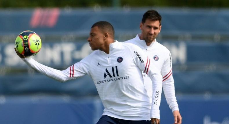 Lionel Messi with Kylian Mbappe. PSG play Club Brugge in their Champions League opener on Wednesday Creator: FRANCK FIFE