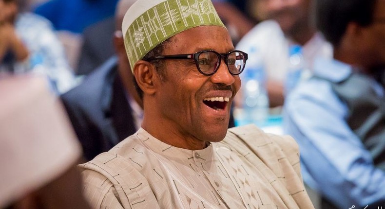 President Muhammadu Buhari laughing