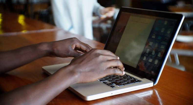 man behind laptop