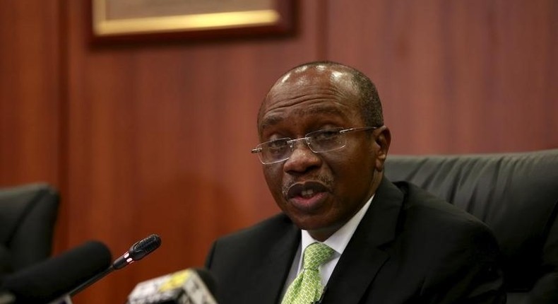 Governor Godwin Emefiele announces that Nigeria's central bank is keeping its benchmark interest rate on hold at 13 percent in Abuja, Nigeria, July 24, 2015. REUTERS/Afolabi Sotunde