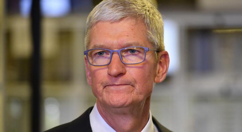 Apple CEO Tim Cook speak to the press during a tour of the Flextronics computer manufacturing facility, with US President Donald Trump, where Apple's Mac Pros are assembled in Austin, Texas, on November 20, 2019.
