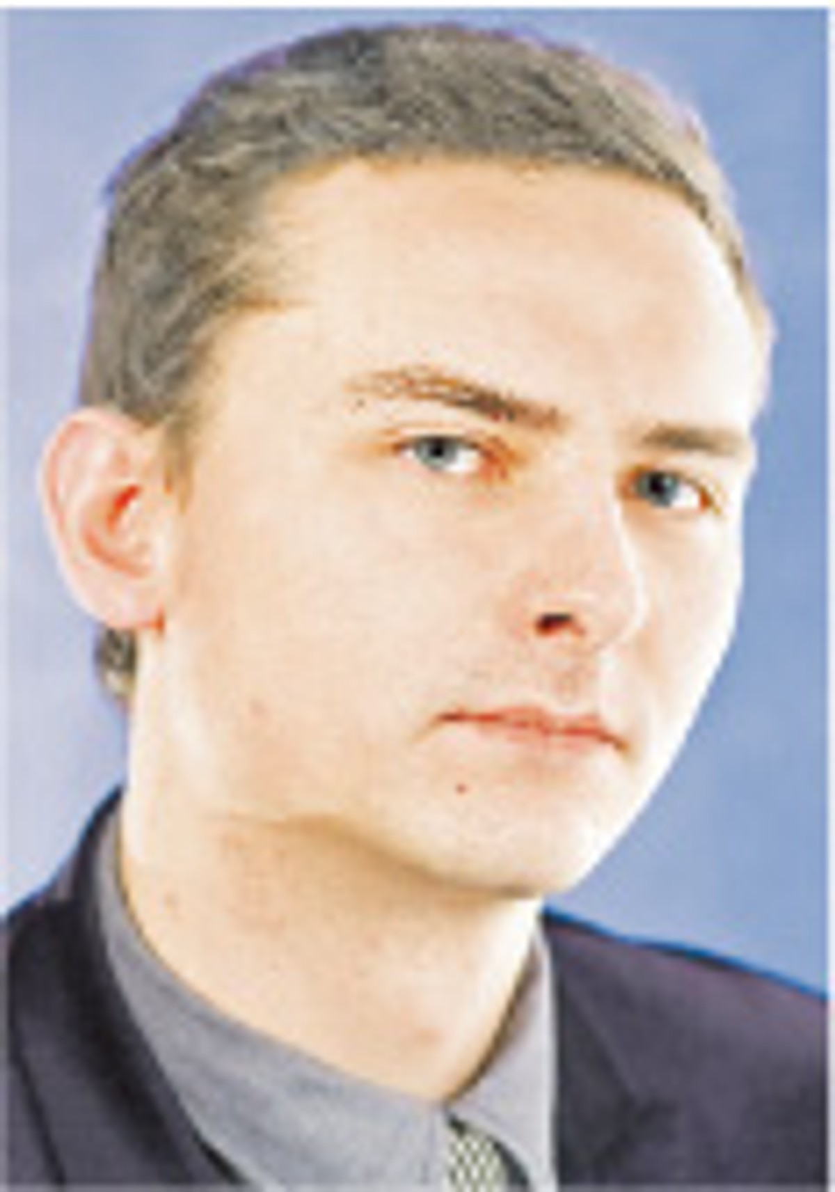 Łukasz Guza, dziennikarz działu praca