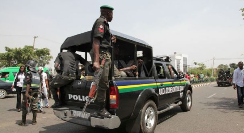 Nigerian Police officers in a patrol vehicle [Dailytrust]