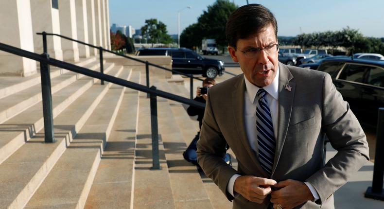 FILE PHOTO: Mark Esper talks to reporters at the Pentagon in Arlington, Virginia, U.S. July 24, 2019. REUTERS/Yuri Gripas