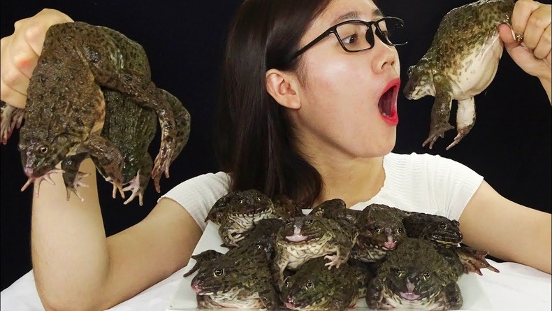 People eat live frogs [YouTube]