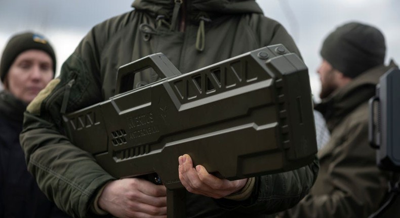 A man holds a portable electronic warfare system at an event in Ukraine earlier this year.Global Images Ukraine via Getty