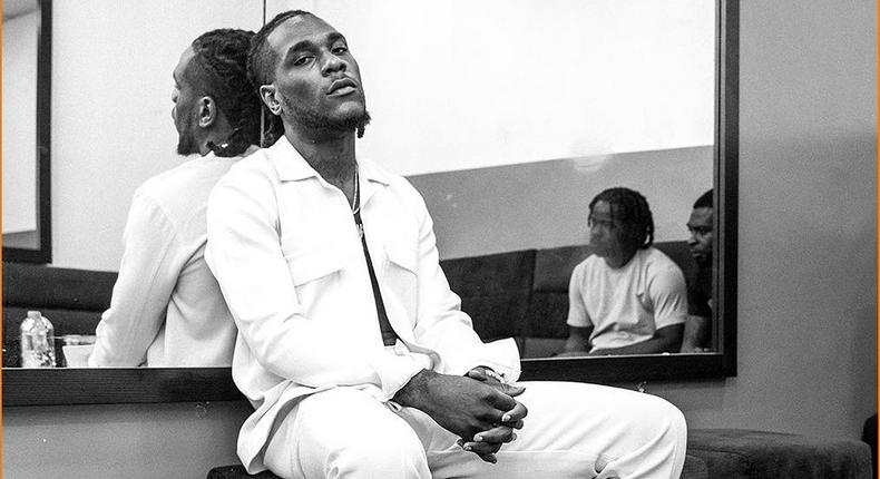 Burna Boy feels sorry for Nigerian artists signing jumping into international record contracts. [Instagram/BurnaBoyGram]