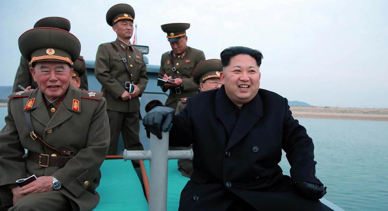 North Korean leader Kim Jong Un inspects the defence detachment on Mahap Islet in the western sector of the front in this undated photo released by KCNA.