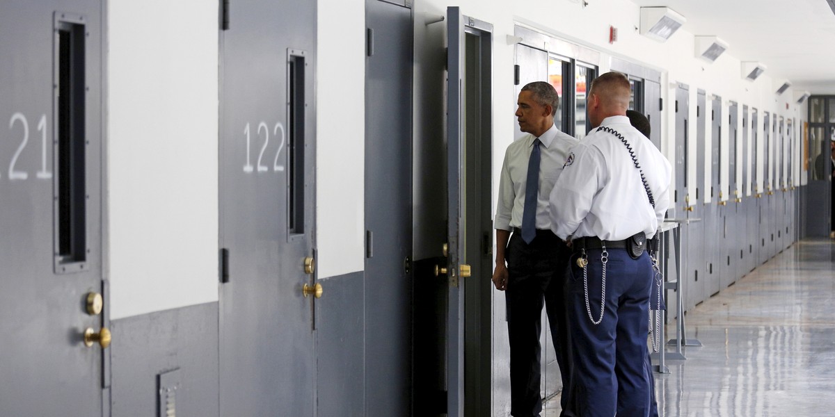 US President Barack Obama inside a cell as he visits the El Reno Federal Correctional Institution outside Oklahoma City on July 16, 2015.