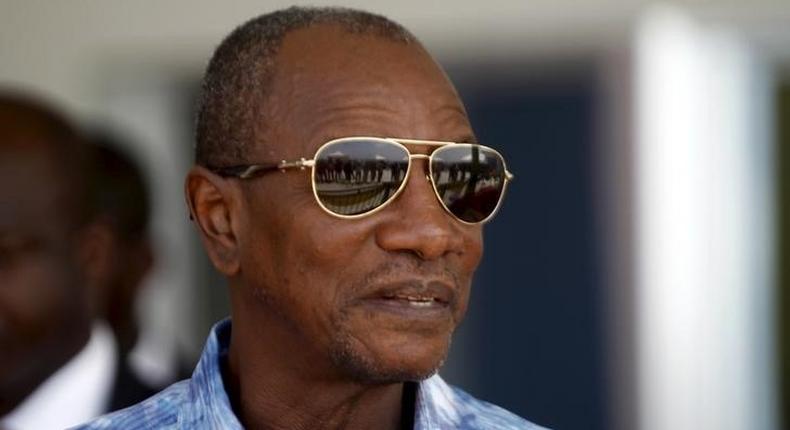 Guinea's president and presidential candidate Alpha Conde, leader of Rassemblement du Peuple de Guinea (RPG), attends the inauguration ceremony of the passenger harbor of Sandervalia in Conakry October 8, 2015. REUTERS/Luc Gnago