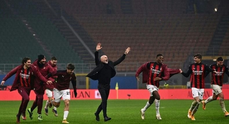 Stefano Pioli's (C) AC Milan are pushing for a first Serie A title since 2011.