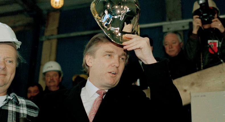 Trump stood at the 55-story Trump Palace, at 69th Street, between Second and Third Avenue, In 1990.AP Photo/Mark Lennihan