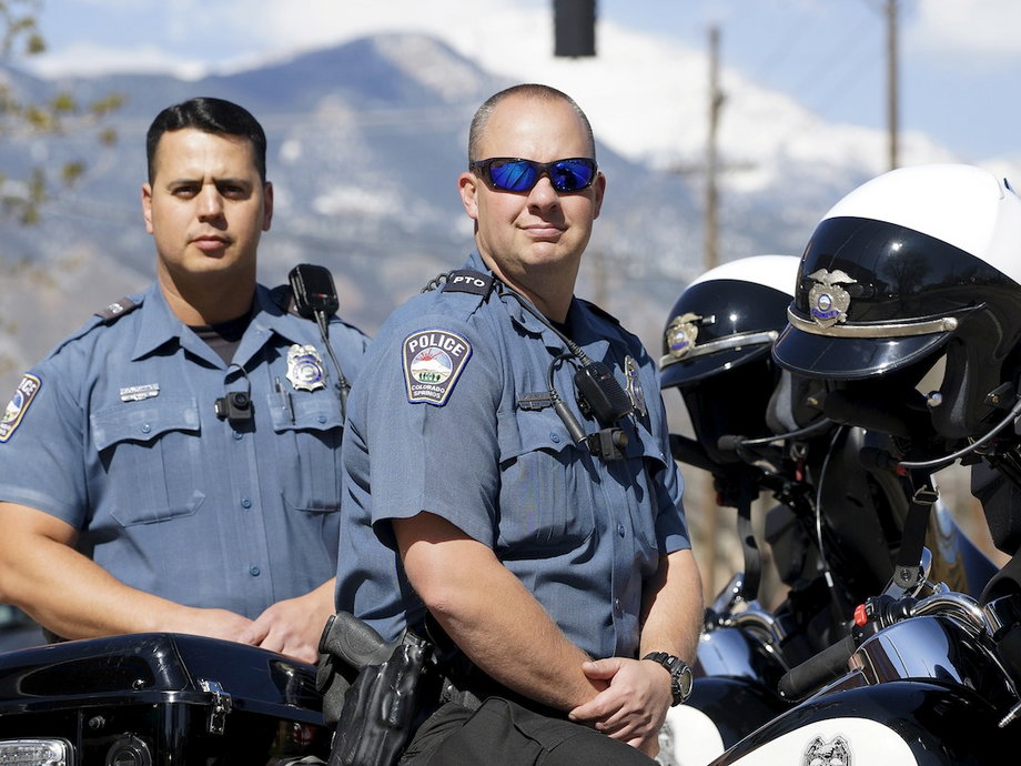 Colorado Springs, Colorado, motor officers pose with Digital Ally First Vu HD body cameras.