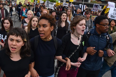 BALTIMORE, MD - MAY 1: Protesters lock arms during a Black Live