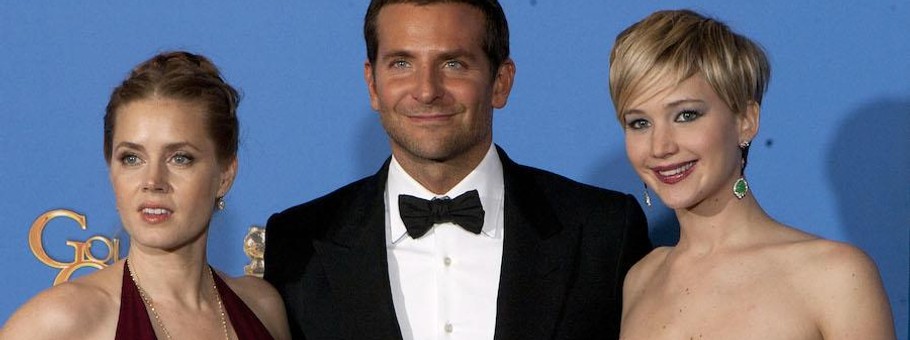 AMY ADAMS, BRADLEY COOPER, and JENNIFER LAWRENCE