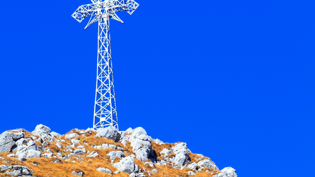 Poland, Tatra Mountains, Zakopane - south slope of the Giewont peak with its historical cross at the top